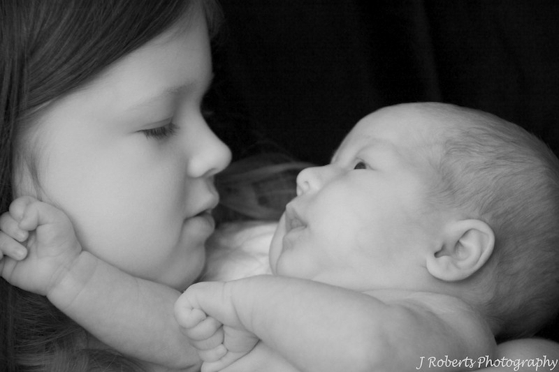 baby and big sister - newborn portrait photography